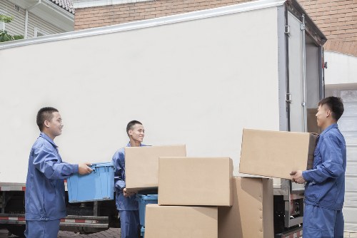 Man With A Van Wallington loading recyclable moving materials for sustainable transport