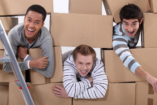 Packed boxes and furniture ready for local removals
