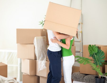 Moving boxes and furniture prepared inside a Wallington property