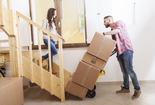 Careful handling of fragile items during a removal job