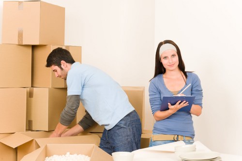 Careful packing of household items for a move in Wallington