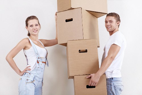 Careful unloading of boxes and furniture at a new Wallington home